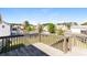 Spacious backyard deck overlooking a fenced yard, perfect for outdoor entertaining and relaxation at 10670 Day Lily Dr, Hampton, GA 30228