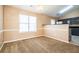 Cozy dining area with neutral tones, ample natural light, and easy access to the kitchen at 10670 Day Lily Dr, Hampton, GA 30228