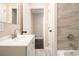 Bathroom featuring a large sink and tiled walls in the shower at 1207 Ellington Dr, Morrow, GA 30260
