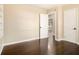 Bedroom with hardwood floors, neutral colors, and doors at 1207 Ellington Dr, Morrow, GA 30260