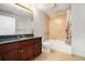 Bathroom with large vanity, shower-tub combo, and tile flooring at 195 14Th Ne St # 1908, Atlanta, GA 30309