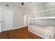 Bedroom features hardwood floors, doorway to bathroom, and built-in bed frame at 195 14Th Ne St # 1908, Atlanta, GA 30309