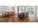 Open-concept living and dining area with hardwood floors and large windows for great natural light at 195 14Th Ne St # 1908, Atlanta, GA 30309