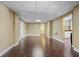 Spacious finished basement area with hardwood floors, recessed lighting, and ample room for activities at 10660 Thatcher Way, Johns Creek, GA 30097