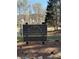 Sign for Parsons Run Lower Recreation Area, a benefit for residents, includes parking notice at 10660 Thatcher Way, Johns Creek, GA 30097
