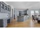Spacious kitchen with gray cabinets, granite countertops, and stainless steel appliances at 10660 Thatcher Way, Johns Creek, GA 30097