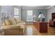 Comfortable home office with a large window, providing plenty of natural light at 10660 Thatcher Way, Johns Creek, GA 30097