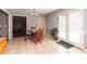 Cozy dining room featuring tile floors, a modern light fixture, and glass doors to the exterior at 11555 Brown Bridge Rd, Covington, GA 30016