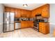 Well-equipped kitchen features stainless steel appliances, lots of storage and tile floors at 11555 Brown Bridge Rd, Covington, GA 30016