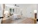 Neutral bedroom with a queen bed, a ceiling fan, and access to a bathroom at 1980 Oakdale Se Ct, Smyrna, GA 30082