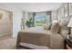 Serene bedroom with a comfortable bed, natural light, and a spacious closet at 2272 Jamin Bnd # 13, Lithonia, GA 30058