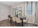 Bright dining area with a modern table, seating for four, and stylish decor at 2272 Jamin Bnd # 13, Lithonia, GA 30058