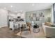 Stylish living room open to the kitchen, with modern furniture and elegant decor at 2272 Jamin Bnd # 13, Lithonia, GA 30058