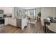 Open-concept living space features a kitchen, dining area, and comfortable living room at 2272 Jamin Bnd # 13, Lithonia, GA 30058