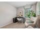 Bright office space with a modern desk, cozy chair, natural light, and tasteful decor for a productive workspace at 2272 Jamin Bnd # 13, Lithonia, GA 30058