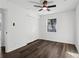 Bright bedroom with hardwood floors, white walls, ceiling fan and natural light from the window at 4378 Glenwood Pkwy, Decatur, GA 30032