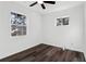 Bedroom with natural light, a ceiling fan, and dark wood flooring at 4378 Glenwood Pkwy, Decatur, GA 30032