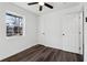 A bright bedroom with ceiling fan and hardwood floors at 4378 Glenwood Pkwy, Decatur, GA 30032