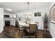 Elegant dining area featuring modern lighting, sleek floors, and a cozy eat-in kitchen at 4378 Glenwood Pkwy, Decatur, GA 30032