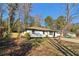 This beautiful white house has a lovely yard, making it an inviting and cozy home at 4378 Glenwood Pkwy, Decatur, GA 30032