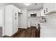 A modern kitchen features white cabinets and stainless steel appliances at 4378 Glenwood Pkwy, Decatur, GA 30032