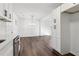 An open concept kitchen and dining area with stainless steel appliances at 4378 Glenwood Pkwy, Decatur, GA 30032