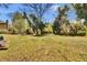 Expansive backyard with lush greenery, mature trees and privacy offering ample space for outdoor activities and relaxation at 561 Culberson Sw St, Atlanta, GA 30310