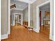 Elegant hallway with hardwood floors, neutral walls, and classic trim at 561 Culberson Sw St, Atlanta, GA 30310