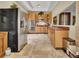 Functional kitchen with stainless steel refrigerator, built-in double oven, and ample counter space at 561 Culberson Sw St, Atlanta, GA 30310