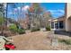 Spacious backyard with a covered porch and a play set, perfect for outdoor activities at 1050 Sunny Field Ct, Lawrenceville, GA 30043