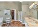 Bathroom featuring a double vanity, shower, and closet at 1050 Sunny Field Ct, Lawrenceville, GA 30043