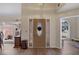 Spacious foyer with hardwood floors and a decorative front door with side lites at 1050 Sunny Field Ct, Lawrenceville, GA 30043
