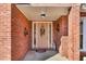 Beautiful brick entryway with a decorative front door and charming details at 1050 Sunny Field Ct, Lawrenceville, GA 30043