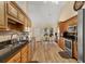 Kitchen with wood cabinets, granite countertops, stainless appliances and breakfast nook at 1050 Sunny Field Ct, Lawrenceville, GA 30043
