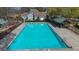 Large community pool with plenty of space for swimming and lounging near two gazebos at 1050 Sunny Field Ct, Lawrenceville, GA 30043