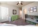 Spacious secondary bedroom featuring carpet floors and a walk-in closet at 1560 Baygreen Rd, Suwanee, GA 30024