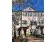 Lovely brick townhome with dark shutters and trim at 1560 Baygreen Rd, Suwanee, GA 30024