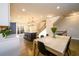 Modern kitchen with island, stainless steel appliances, and open to the dining area at 1560 Baygreen Rd, Suwanee, GA 30024