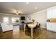 Inviting living and dining area with fireplace and access to the outdoor deck at 1560 Baygreen Rd, Suwanee, GA 30024