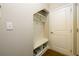Mudroom features a built-in bench, cubbies for storage, and access to the home's interior at 1560 Baygreen Rd, Suwanee, GA 30024