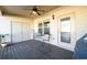 Comfortable covered patio area with room for seating and entertaining at 1560 Baygreen Rd, Suwanee, GA 30024