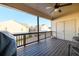 Relaxing covered patio with ceiling fan and private outdoor space at 1560 Baygreen Rd, Suwanee, GA 30024
