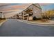 Attractive multi-story townhomes with well-manicured landscaping at 1560 Baygreen Rd, Suwanee, GA 30024
