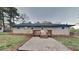 This backyard offers a deck with gravel, great for entertaining guests and relaxing at 1735 W Austin Rd, Decatur, GA 30032