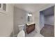 Bathroom featuring a modern vanity, updated fixtures, tile flooring, and access to bedroom at 1735 W Austin Rd, Decatur, GA 30032