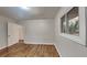 This bedroom offers hardwood floors and bright windows at 1735 W Austin Rd, Decatur, GA 30032