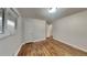Bright bedroom featuring hardwood floors, white walls, window with blinds and closet for ample storage at 1735 W Austin Rd, Decatur, GA 30032