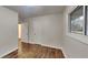Bedroom featuring hardwood floors, neutral paint, closet and natural light at 1735 W Austin Rd, Decatur, GA 30032