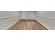 Bright living room with newly refinished hardwood floors and neutral paint at 1735 W Austin Rd, Decatur, GA 30032
