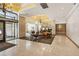 A stunning building lobby featuring lots of seating, light and elegant floors at 300 Peachtree Ne St # 17H, Atlanta, GA 30308